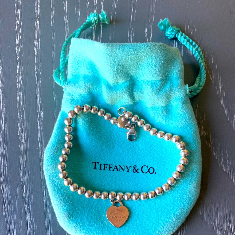 Tiffany sterling silver/ rubedo heart bracelet.
